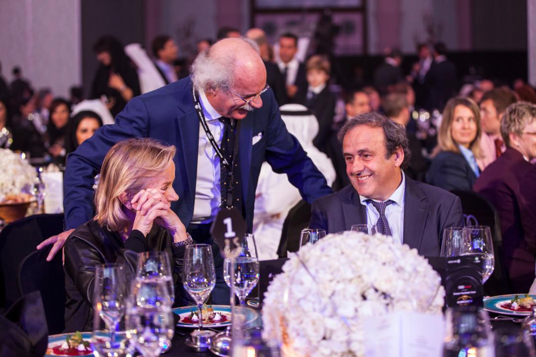 Guests talking at a dinner table