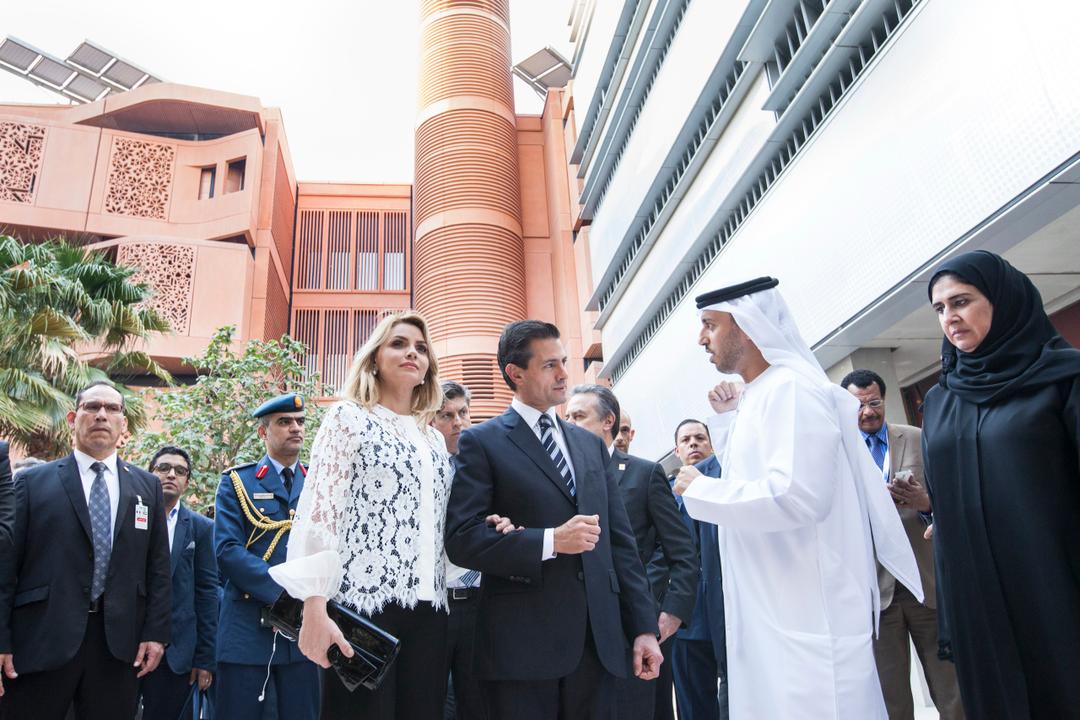 Official delegation visiting a modern city district